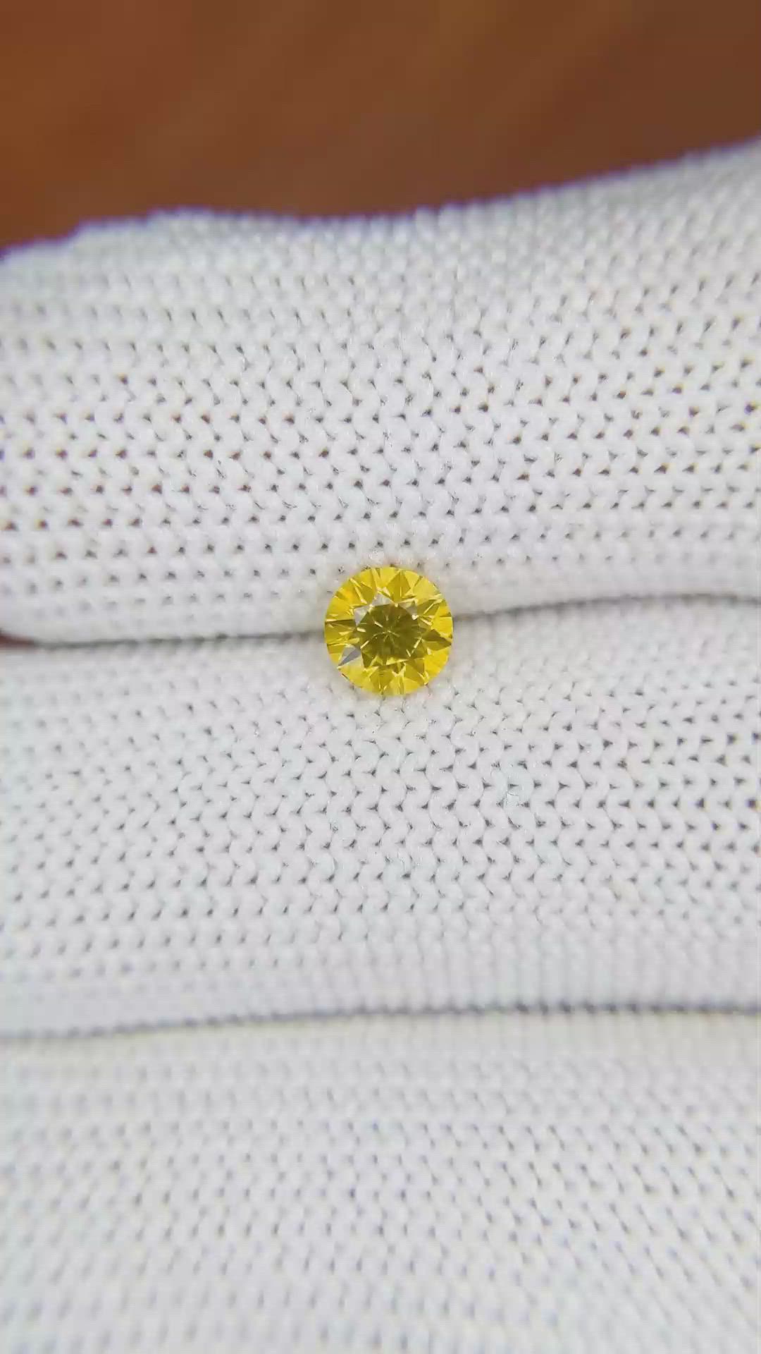 0.66 Ct. Orangish Yellow Sapphire from Ceylon (Sri Lanka) Size Video
