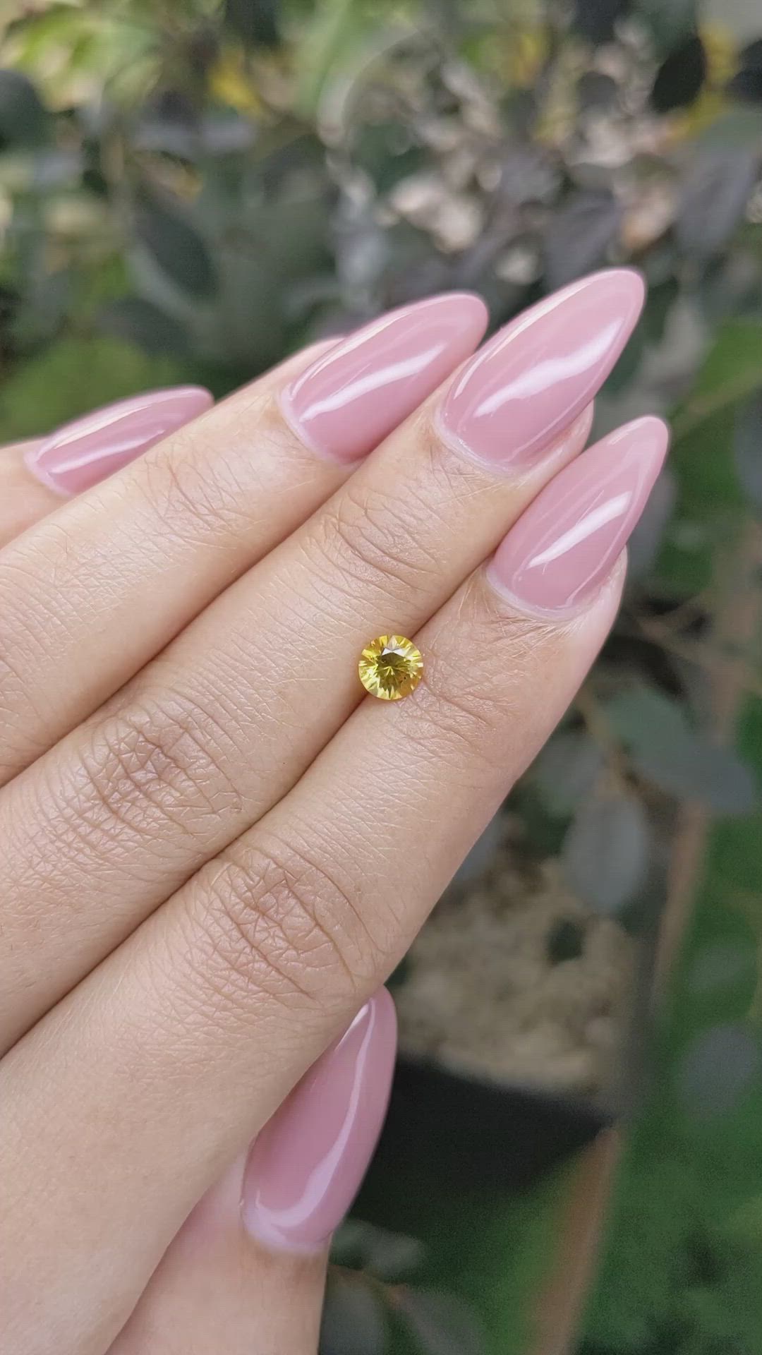 0.66 Ct. Orangish Yellow Sapphire from Ceylon (Sri Lanka) Size Video