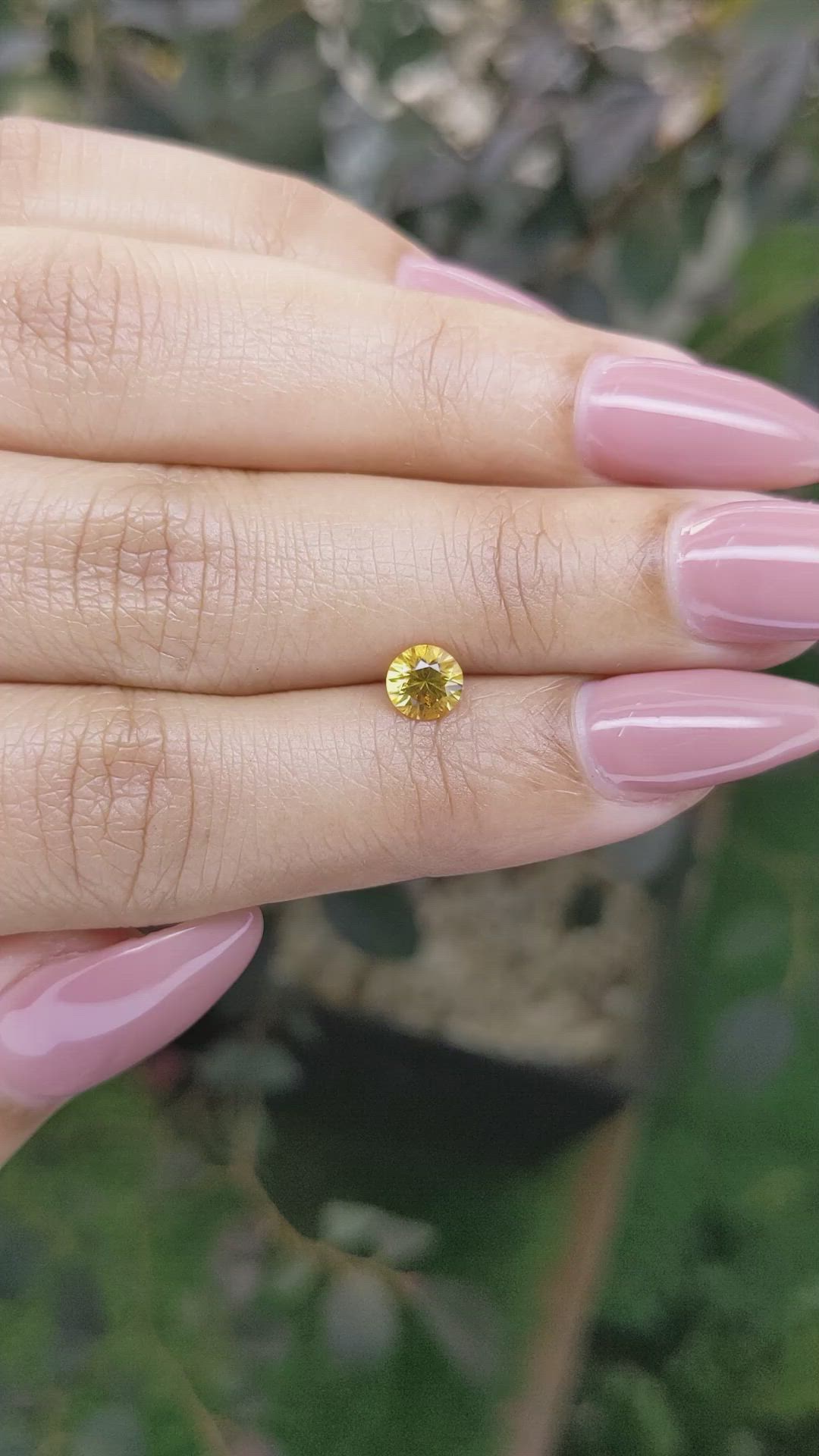 0.66 Ct. Orangish Yellow Sapphire from Ceylon (Sri Lanka) Size Video