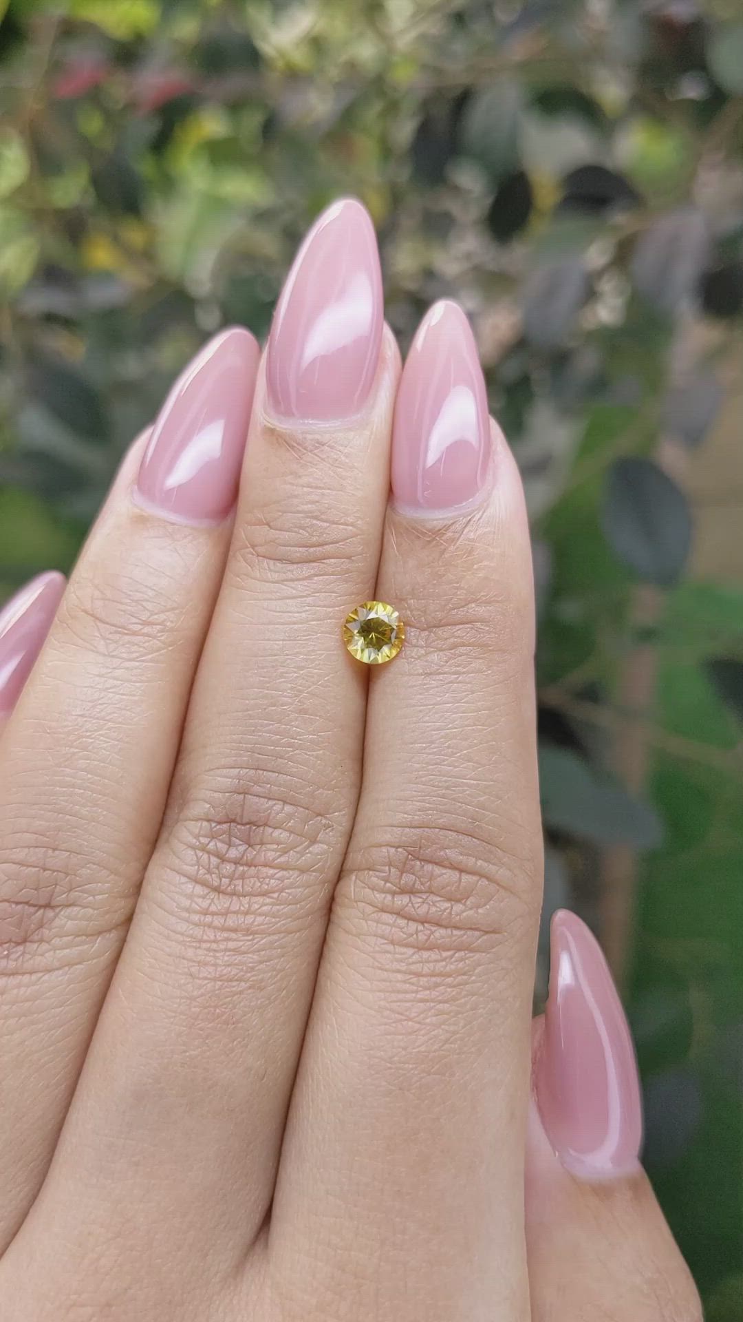 0.66 Ct. Orangish Yellow Sapphire from Ceylon (Sri Lanka) Size Video