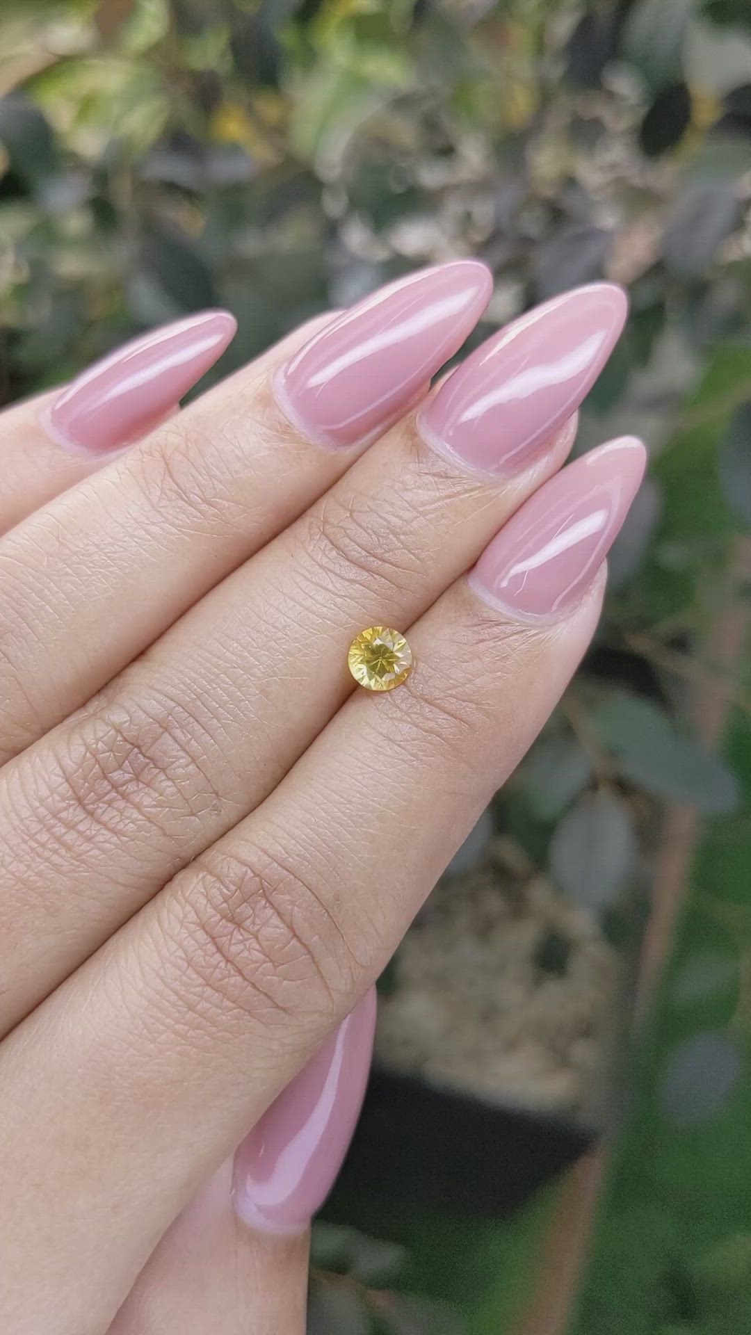 0.61 Ct. Orangish Yellow Sapphire from Ceylon (Sri Lanka) Size Video