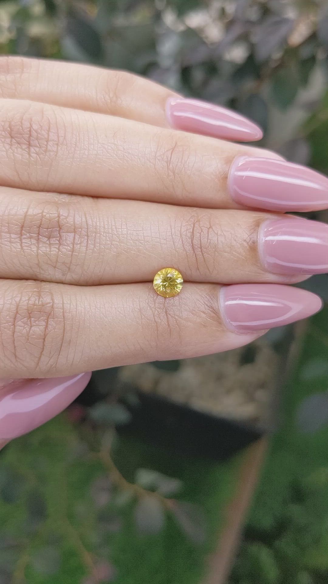 0.61 Ct. Orangish Yellow Sapphire from Ceylon (Sri Lanka) Size Video