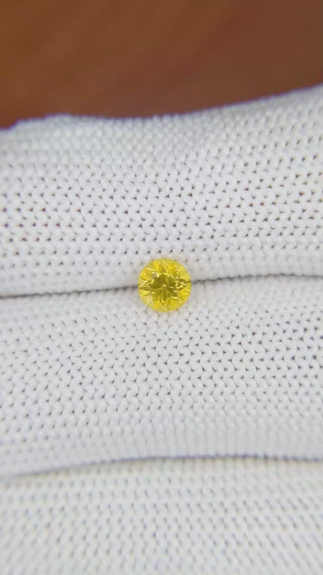 0.61 Ct. Orangish Yellow Sapphire from Ceylon (Sri Lanka) Size Video