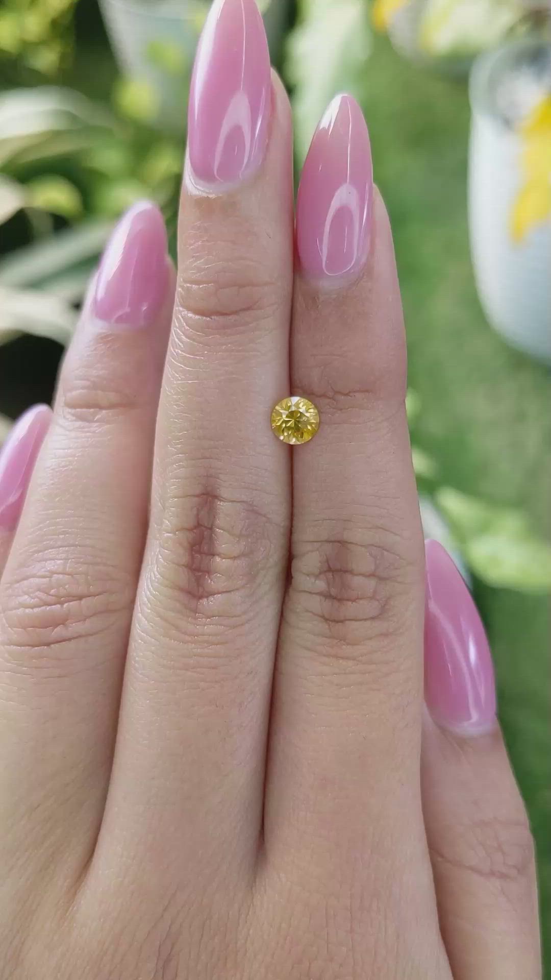 0.66 Ct. Orangish Yellow Sapphire from Ceylon (Sri Lanka) Size Video