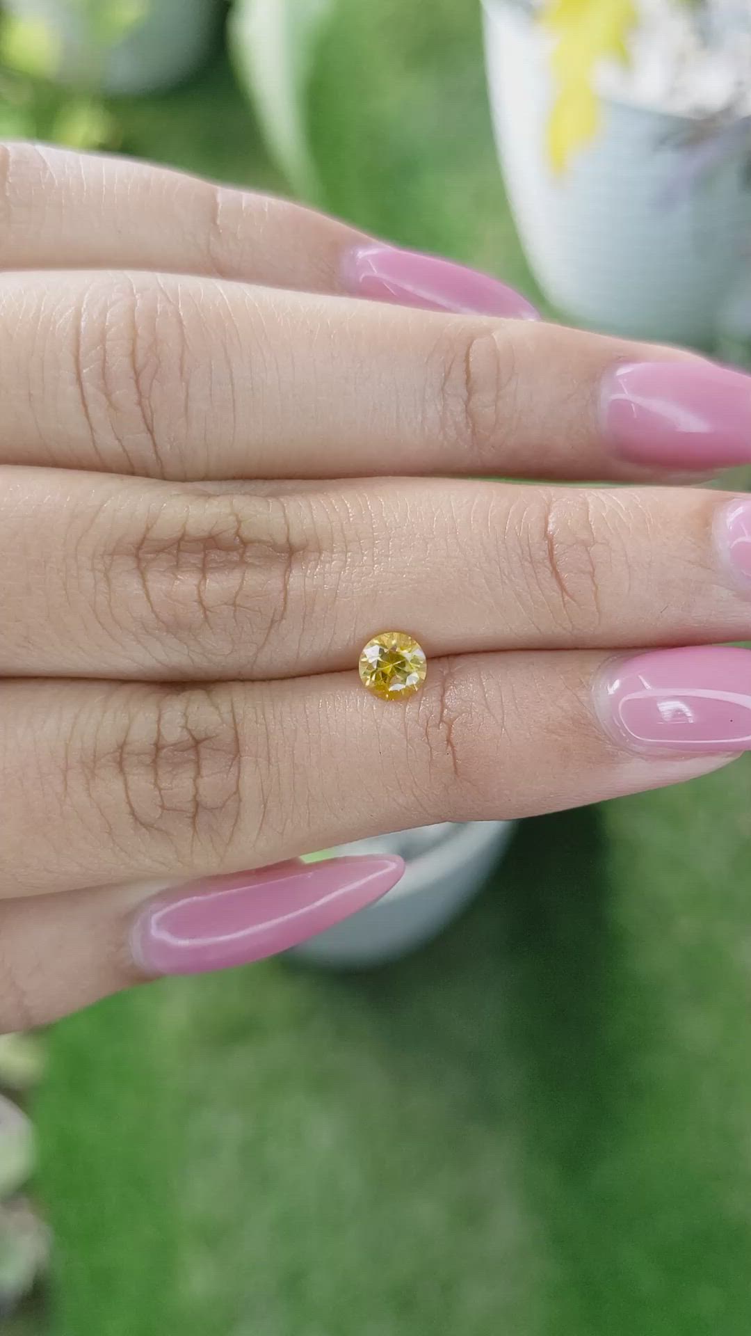 0.66 Ct. Orangish Yellow Sapphire from Ceylon (Sri Lanka) Size Video