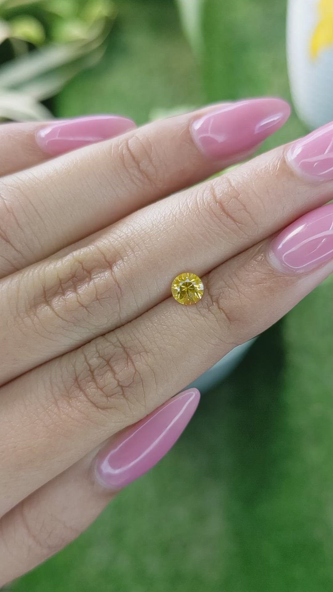 0.66 Ct. Orangish Yellow Sapphire from Ceylon (Sri Lanka) Size Video