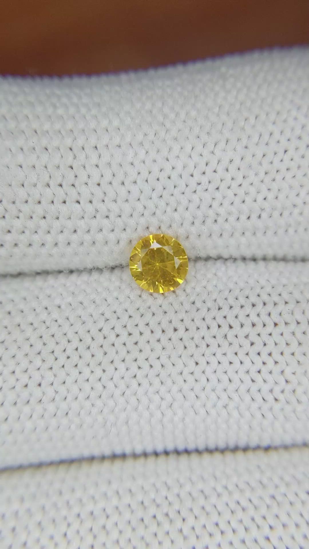 0.55 Ct. Orangish Yellow Sapphire from Ceylon (Sri Lanka) Size Video