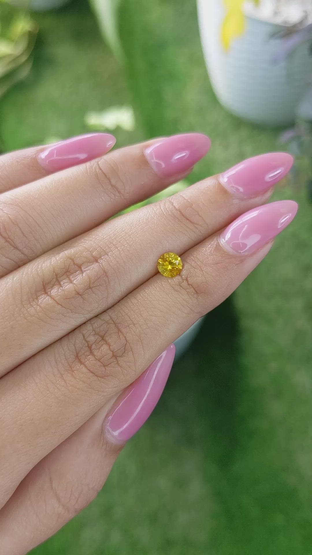 0.55 Ct. Orangish Yellow Sapphire from Ceylon (Sri Lanka) Size Video