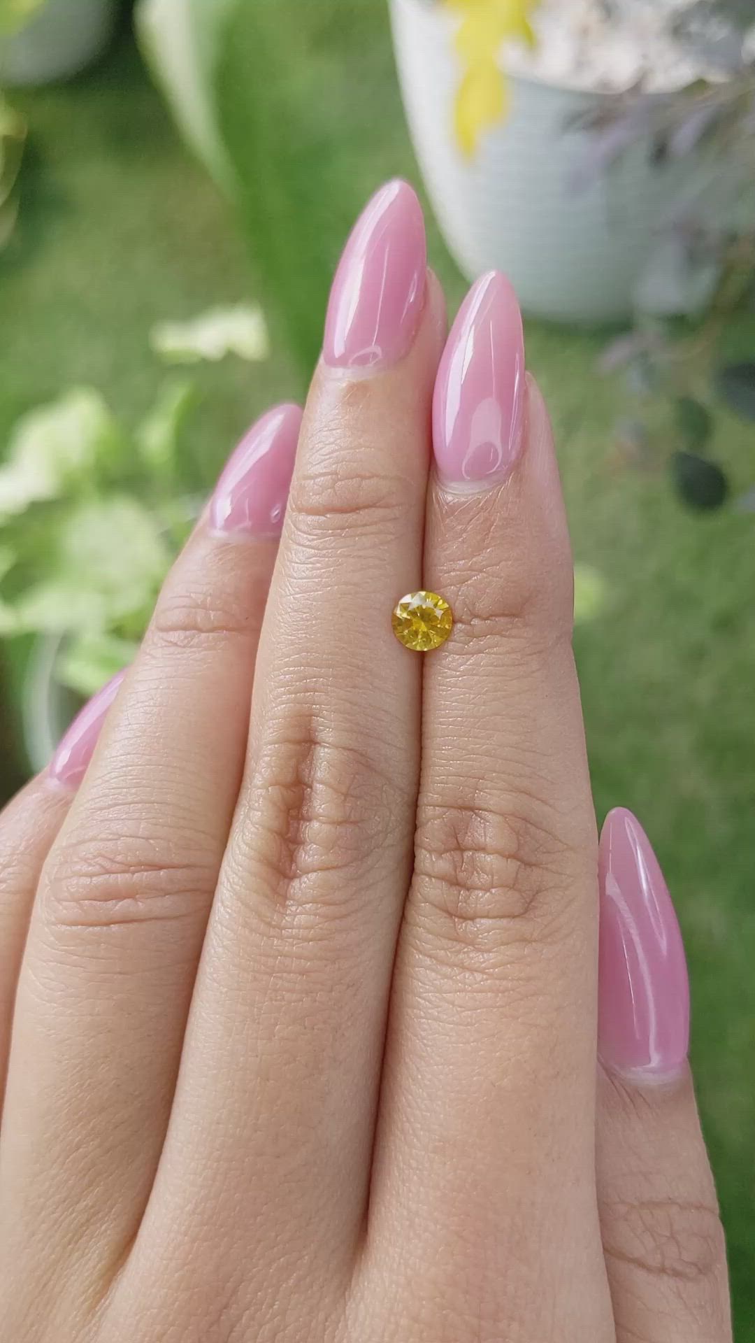 0.55 Ct. Orangish Yellow Sapphire from Ceylon (Sri Lanka) Size Video