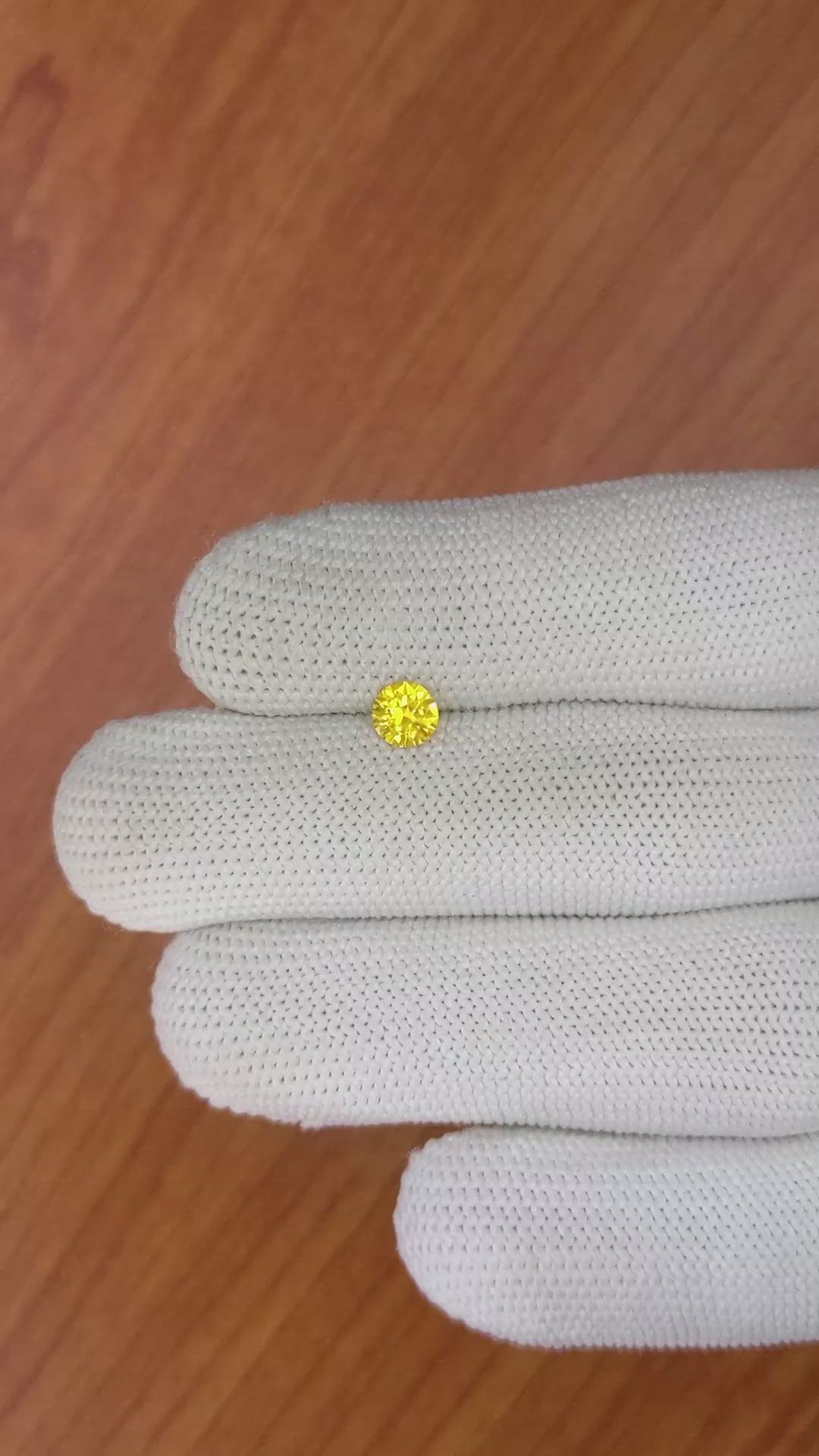 0.55 Ct. Orangish Yellow Sapphire from Ceylon (Sri Lanka) Size Video