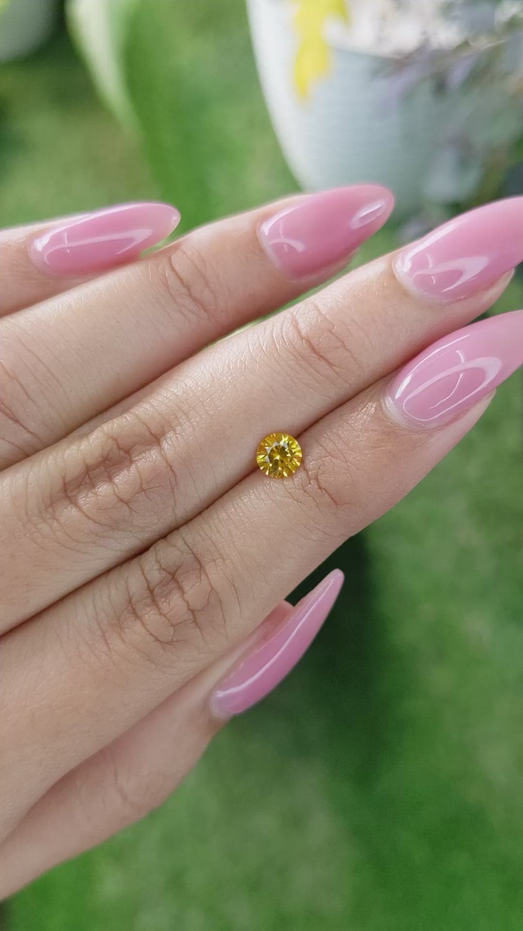 0.55 Ct. Orangish Yellow Sapphire from Ceylon (Sri Lanka) Size Video
