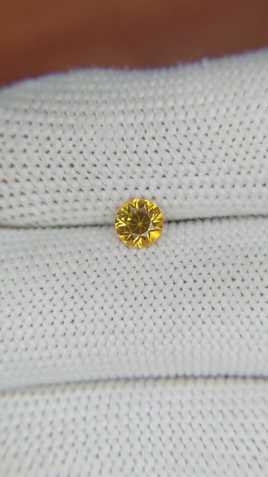 0.55 Ct. Orangish Yellow Sapphire from Ceylon (Sri Lanka) Size Video