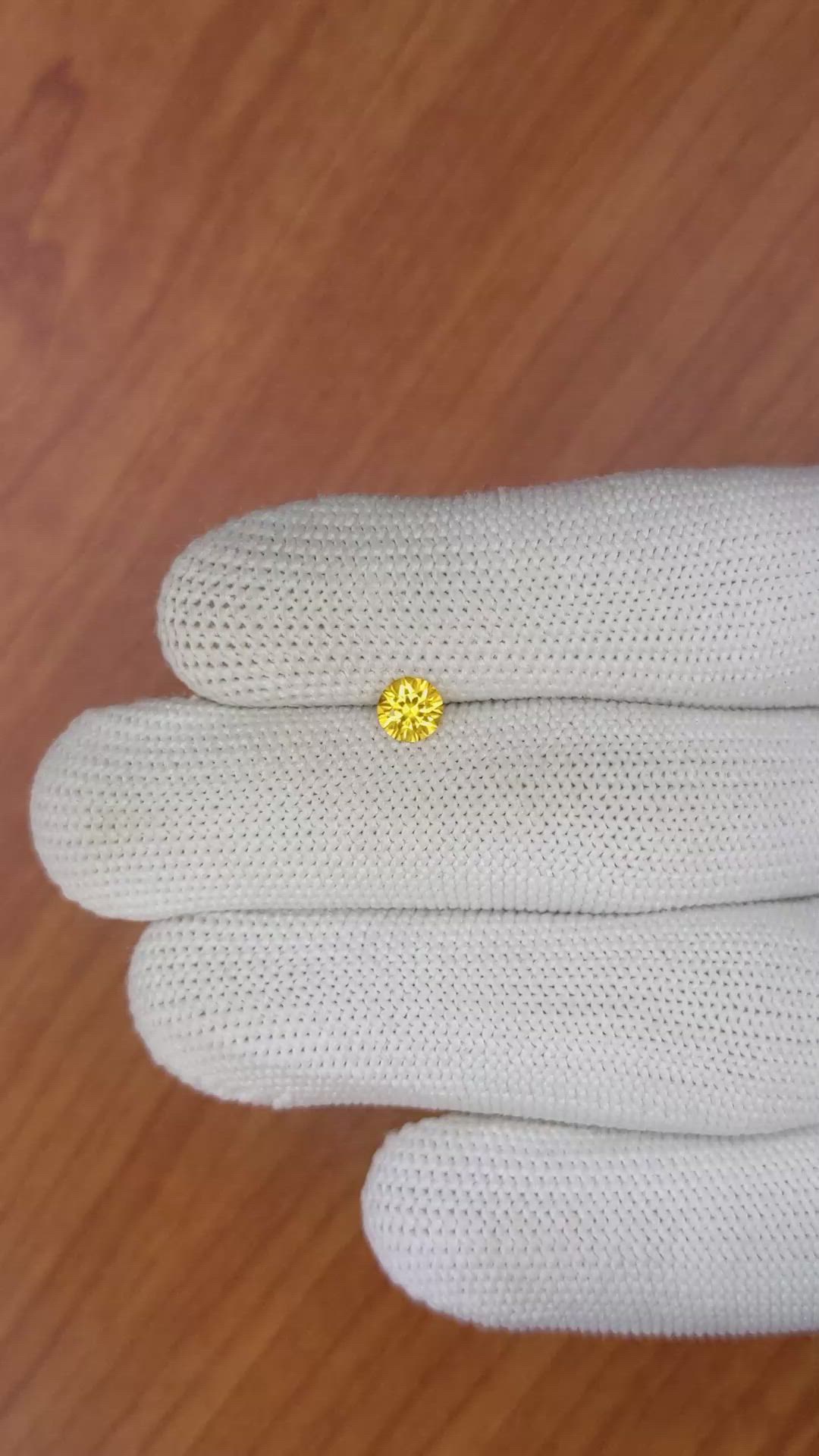 0.55 Ct. Orangish Yellow Sapphire from Ceylon (Sri Lanka) Size Video