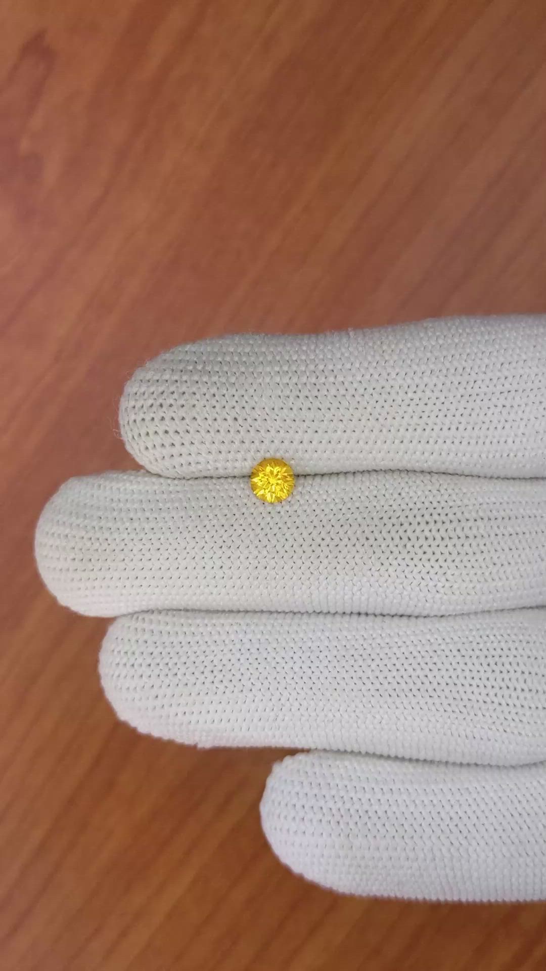 0.60 Ct. Yellowish Orange Sapphire from Ceylon (Sri Lanka) Size Video