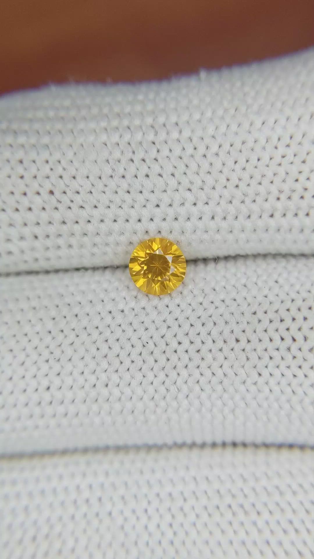 0.60 Ct. Yellowish Orange Sapphire from Ceylon (Sri Lanka) Size Video