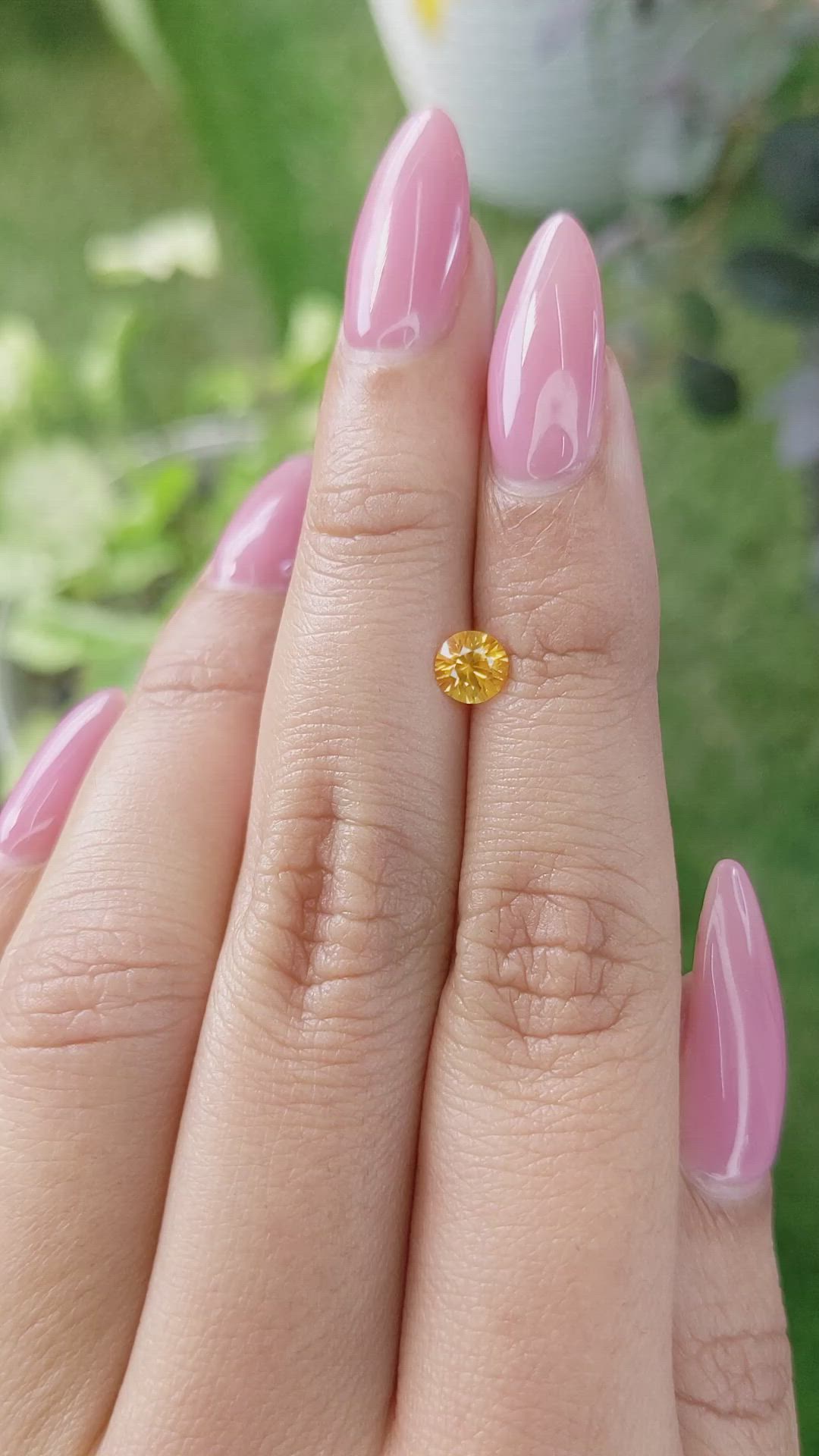 0.60 Ct. Yellowish Orange Sapphire from Ceylon (Sri Lanka) Size Video
