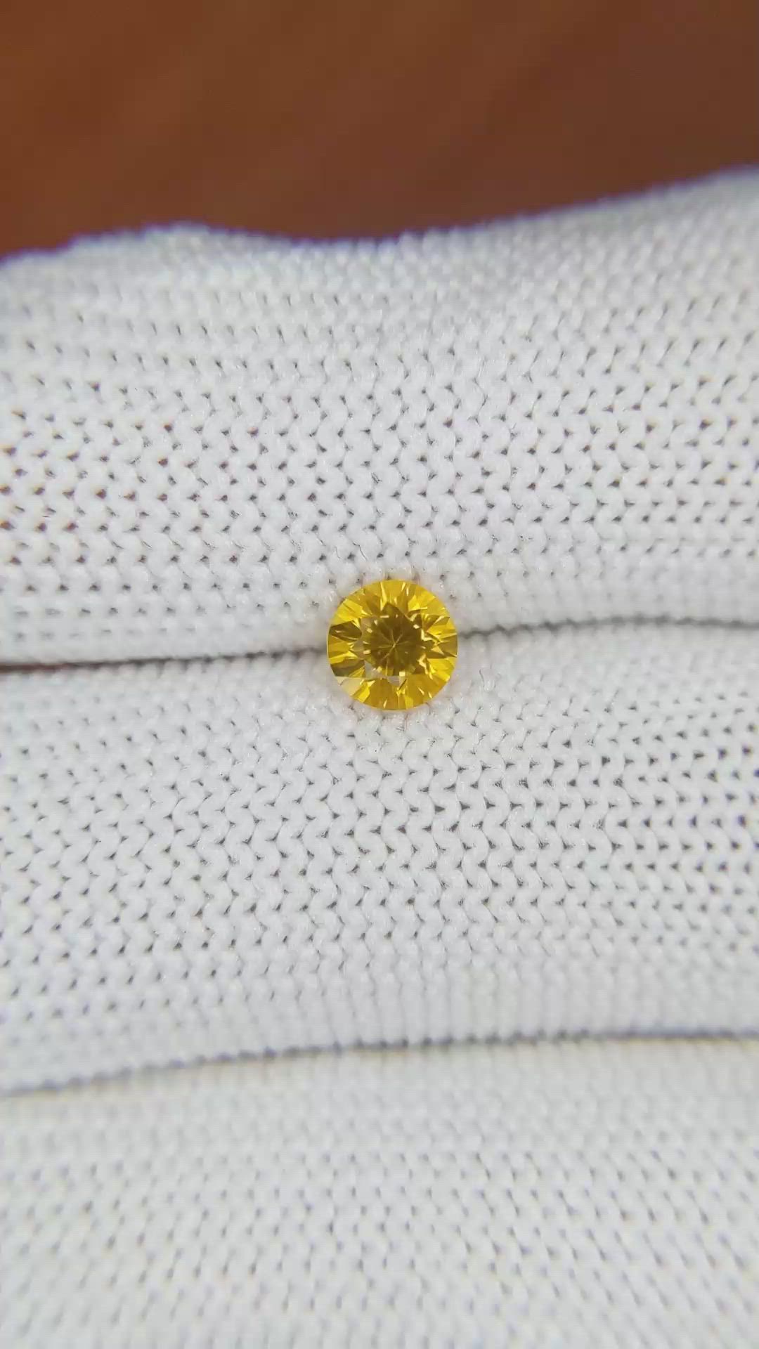 0.68 Ct. Yellowish Orange Sapphire from Ceylon (Sri Lanka) Size Video