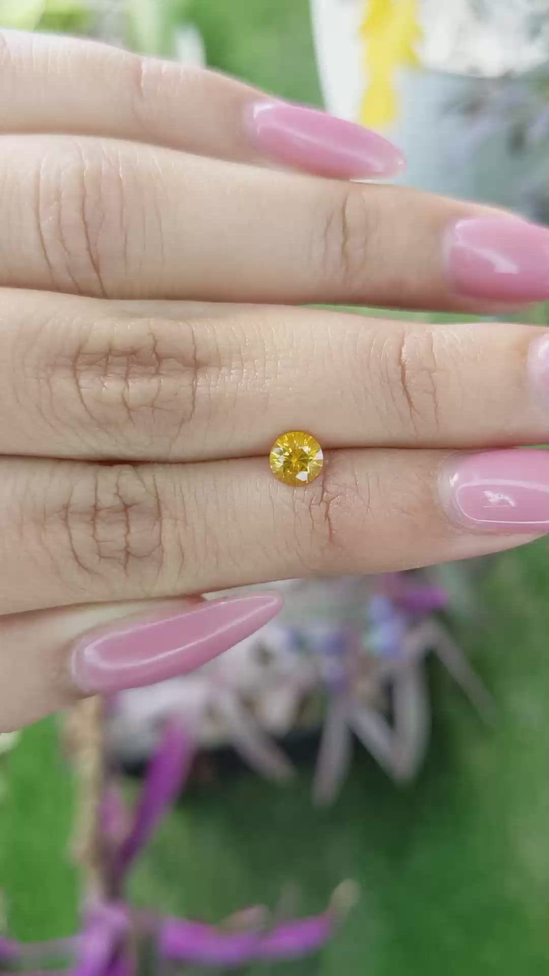 0.68 Ct. Yellowish Orange Sapphire from Ceylon (Sri Lanka) Size Video