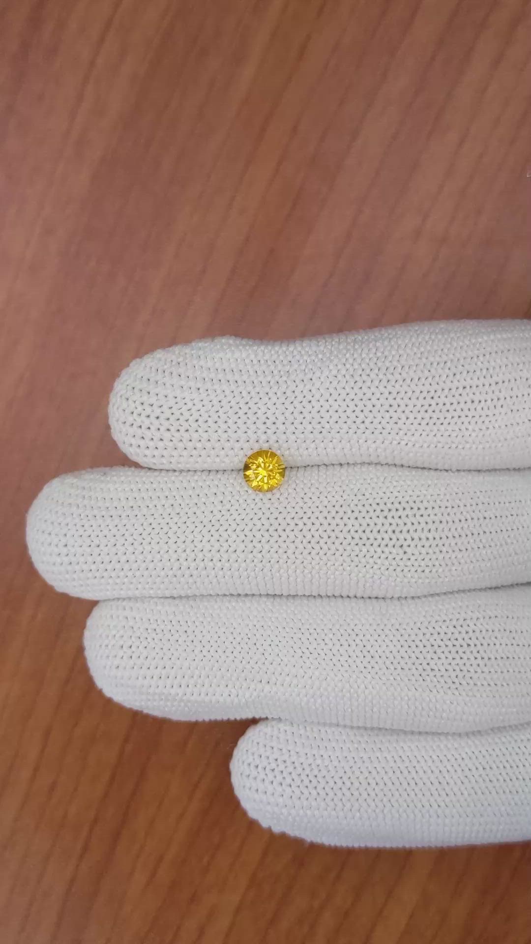 0.68 Ct. Yellowish Orange Sapphire from Ceylon (Sri Lanka) Size Video