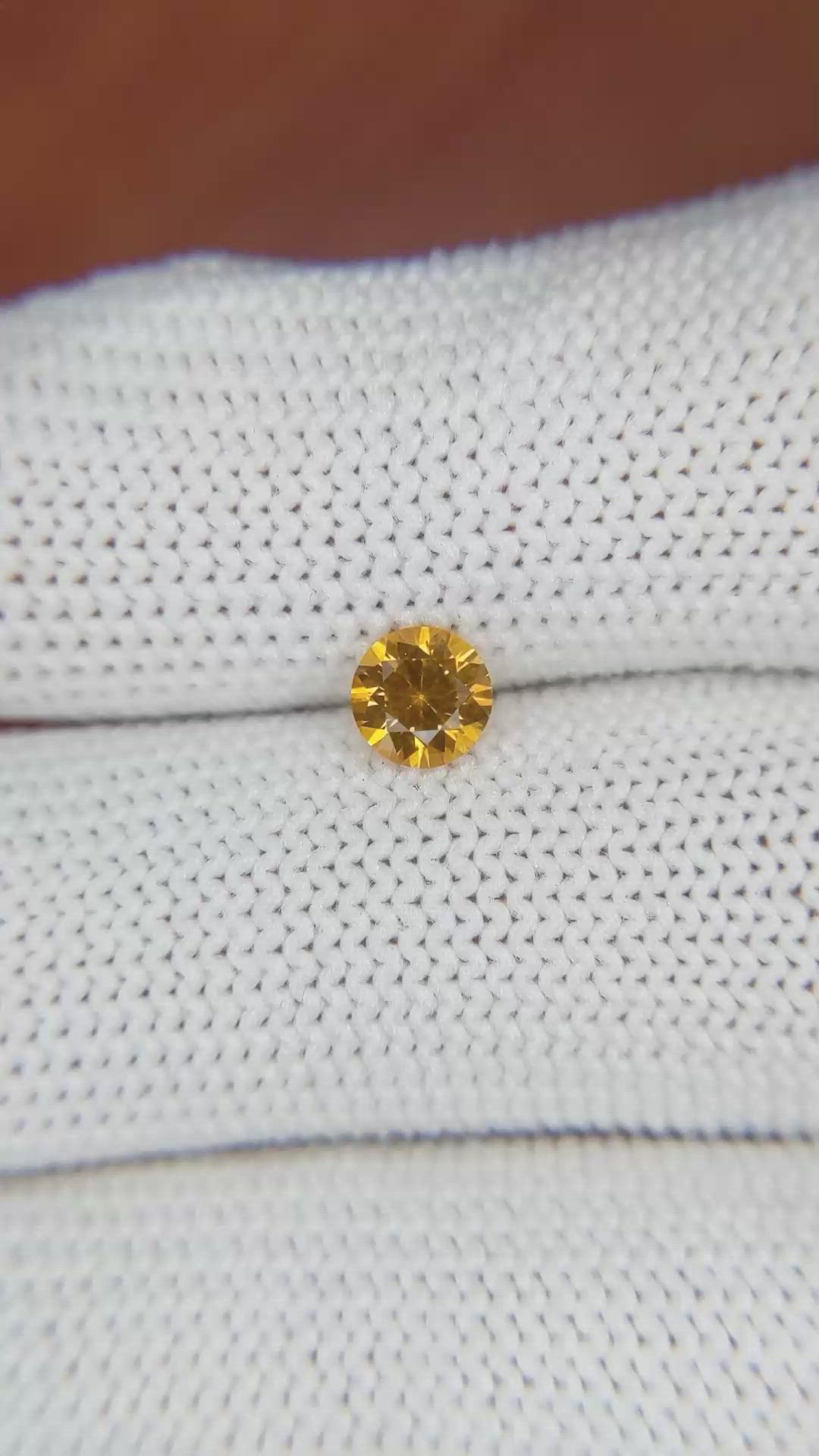0.60 Ct. Yellowish Orange Sapphire from Ceylon (Sri Lanka) Size Video