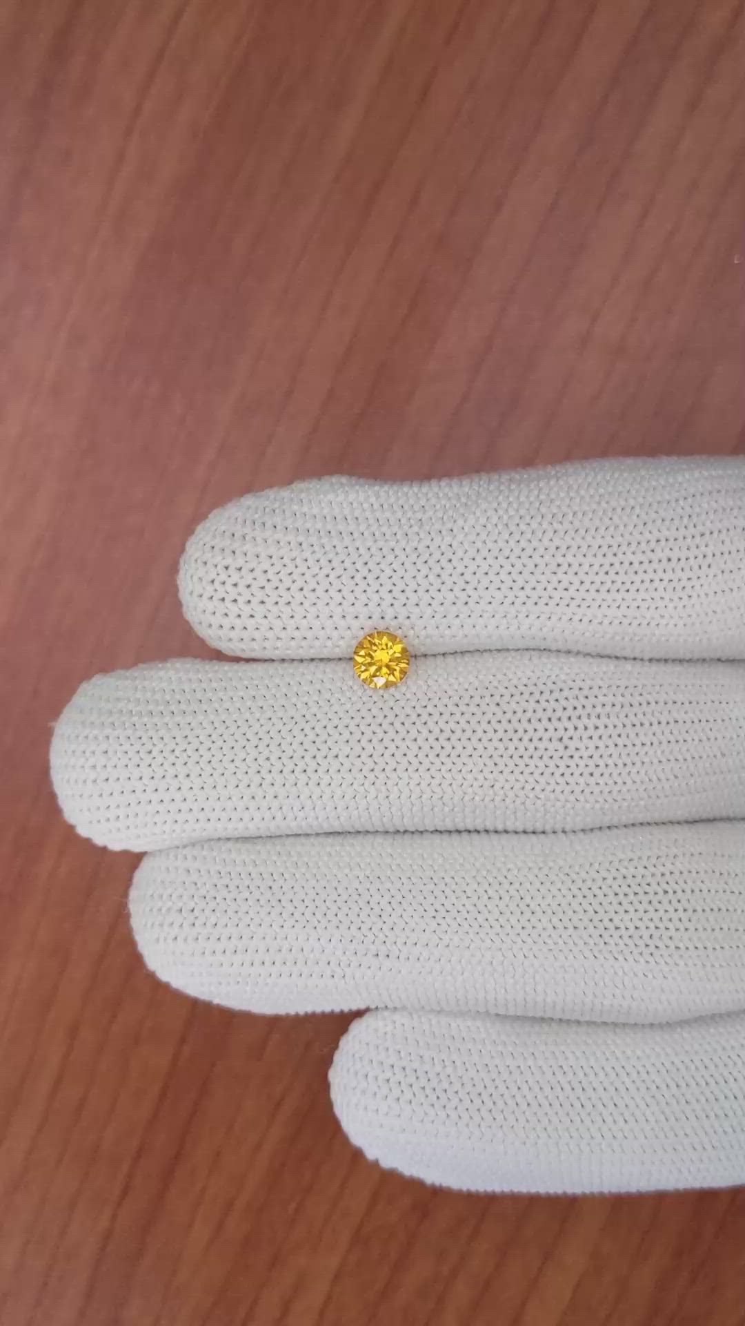 0.60 Ct. Yellowish Orange Sapphire from Ceylon (Sri Lanka) Size Video