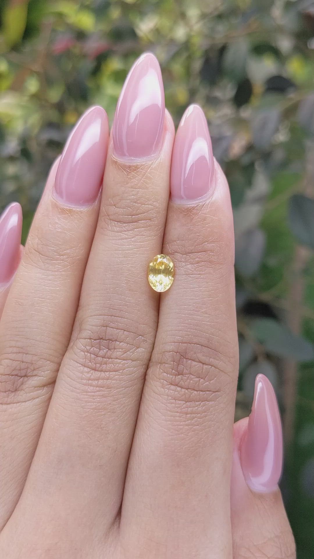 0.95 Ct. Orangish Yellow Sapphire from Ceylon (Sri Lanka) Size Video