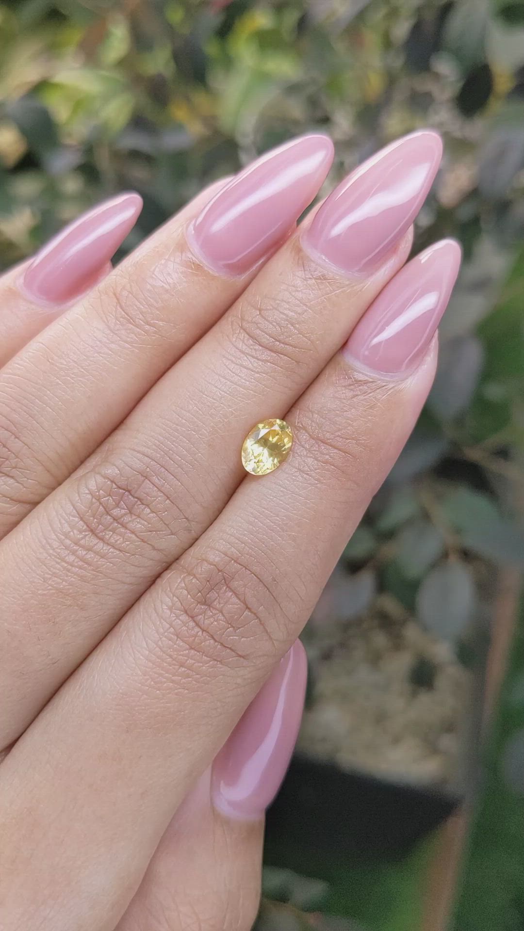 0.95 Ct. Orangish Yellow Sapphire from Ceylon (Sri Lanka) Size Video