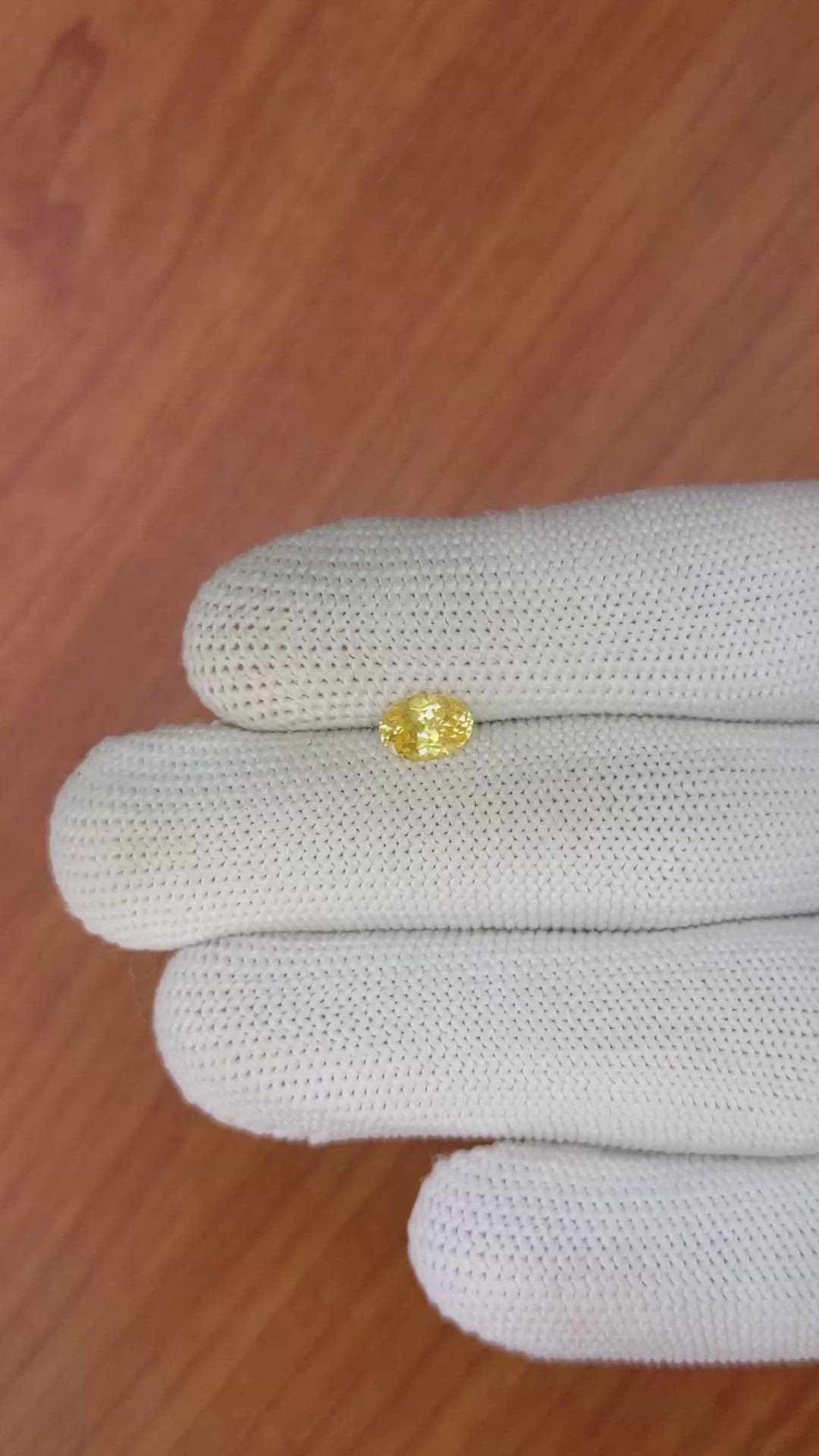 0.95 Ct. Orangish Yellow Sapphire from Ceylon (Sri Lanka) Size Video