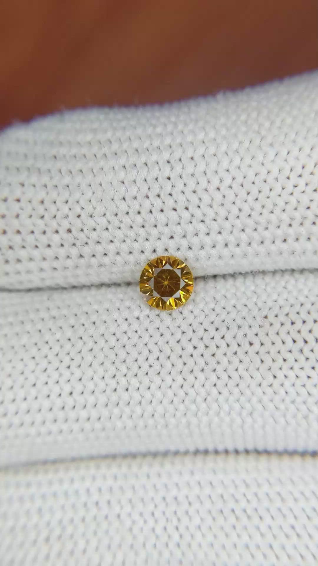 0.51 Ct. Yellowish Orange Sapphire from Ceylon (Sri Lanka) Size Video
