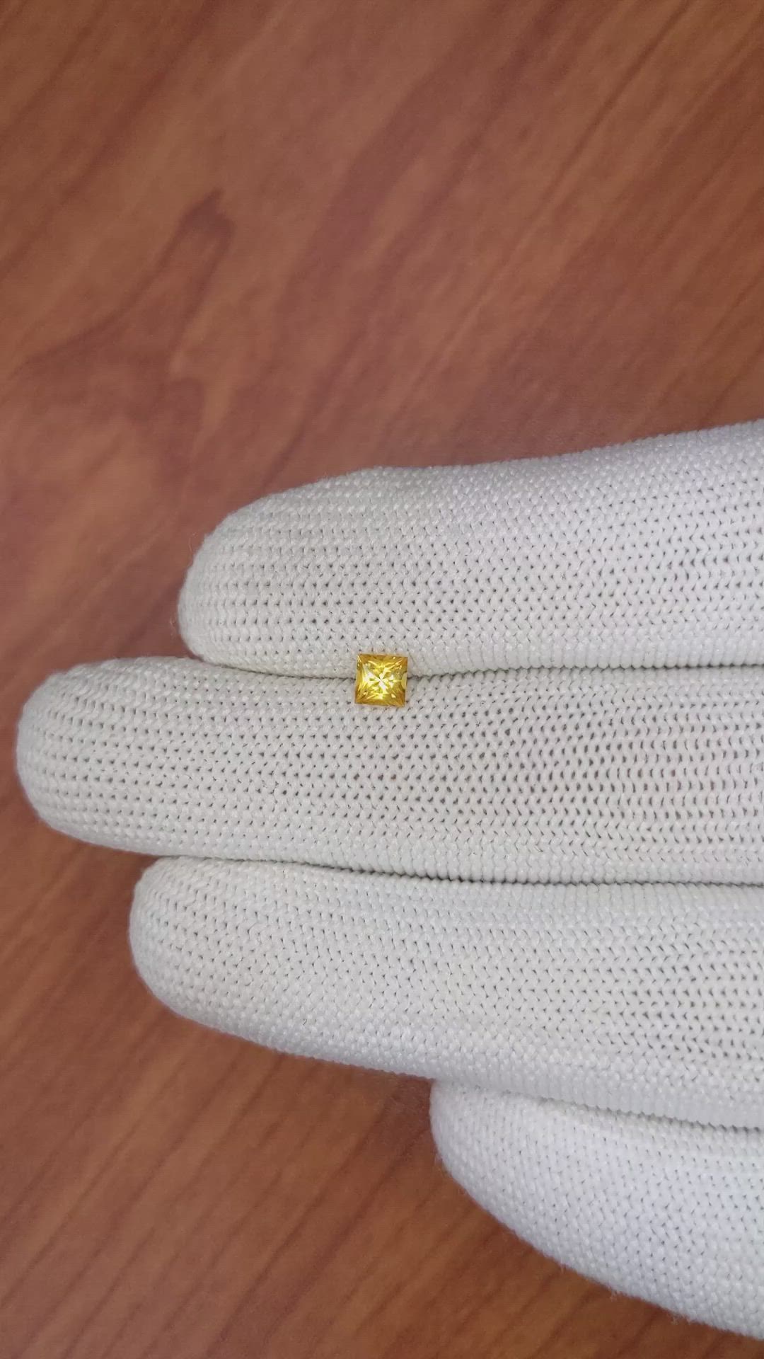 0.42 Ct. Orangish Yellow Sapphire from Ceylon (Sri Lanka) Size Video