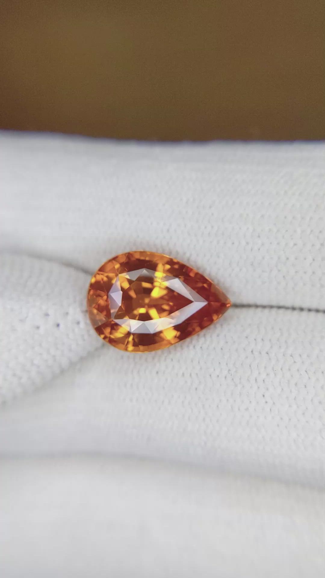 7.56 Ct. Orange Sapphire from Ceylon (Sri Lanka) Size Video