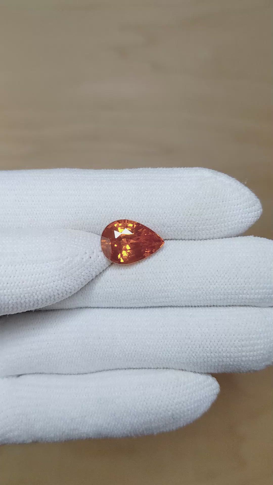 7.56 Ct. Orange Sapphire from Ceylon (Sri Lanka) Size Video