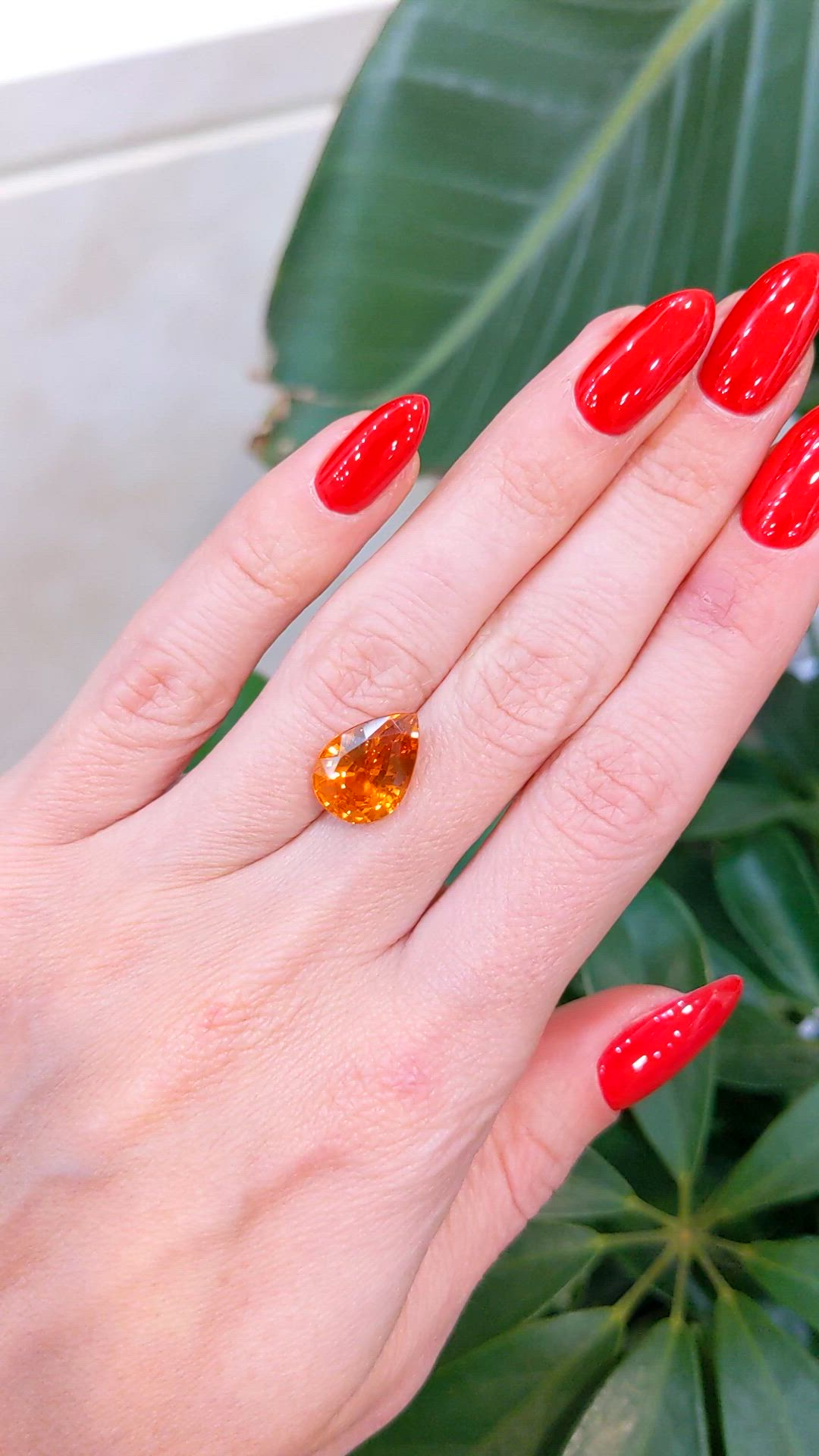 7.56 Ct. Orange Sapphire from Ceylon (Sri Lanka) Size Video