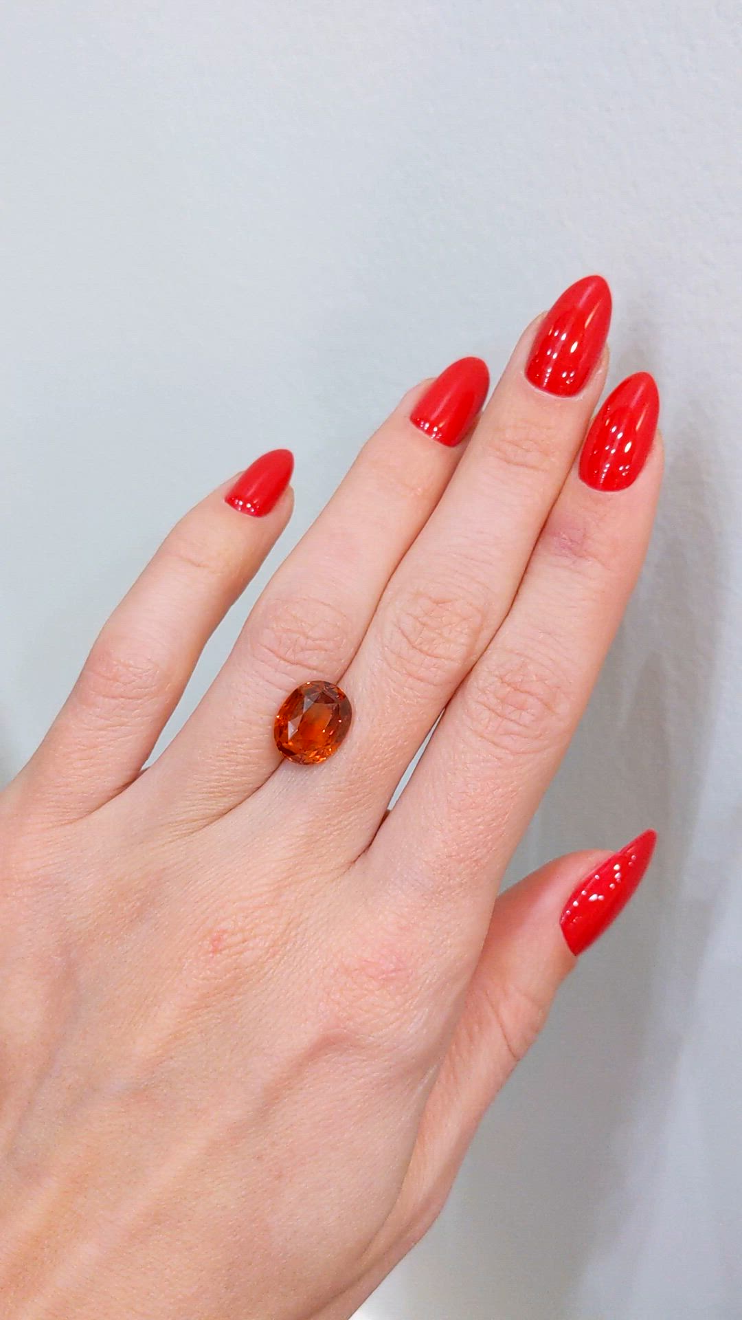 5.57 Ct. Orange Sapphire from Ceylon (Sri Lanka) Size Video