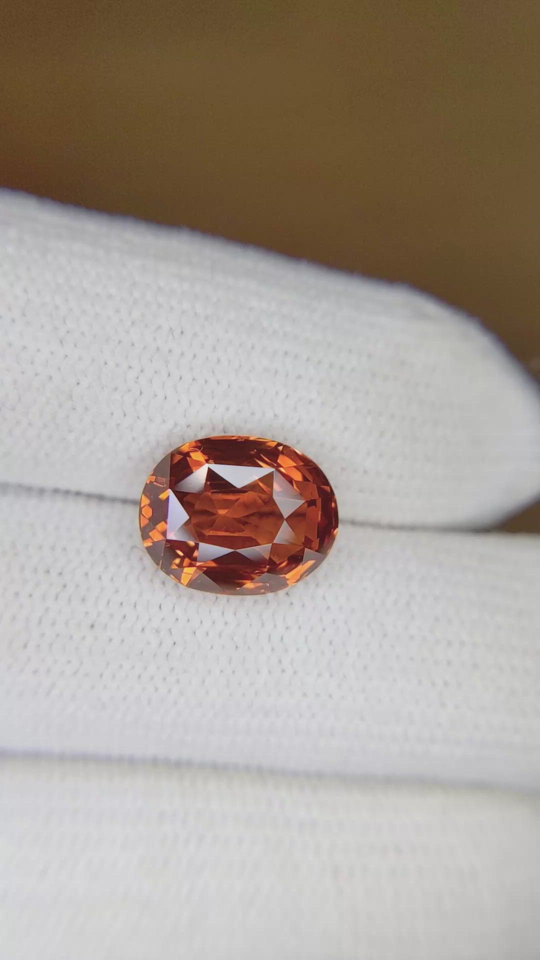 5.57 Ct. Orange Sapphire from Ceylon (Sri Lanka) Size Video