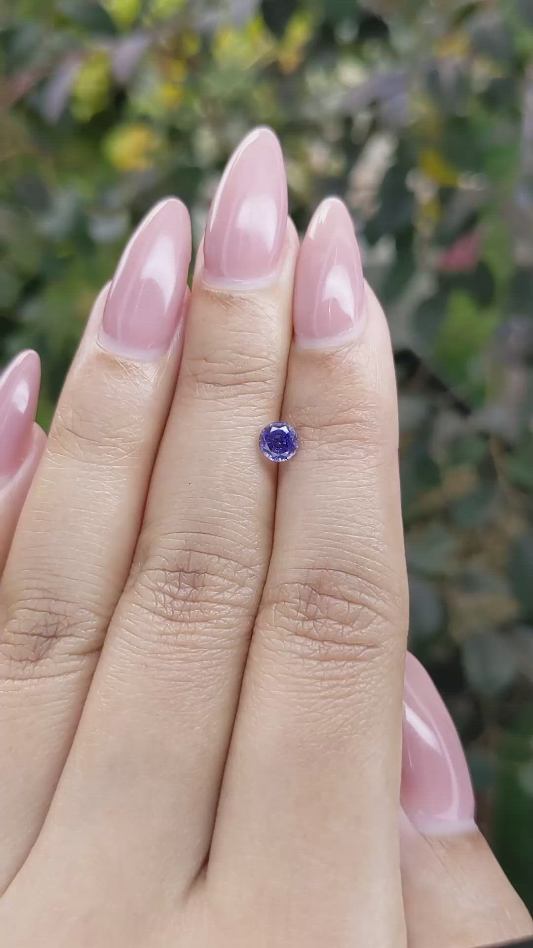 0.60 Ct. Violet Sapphire from Ceylon (Sri Lanka) Size Video