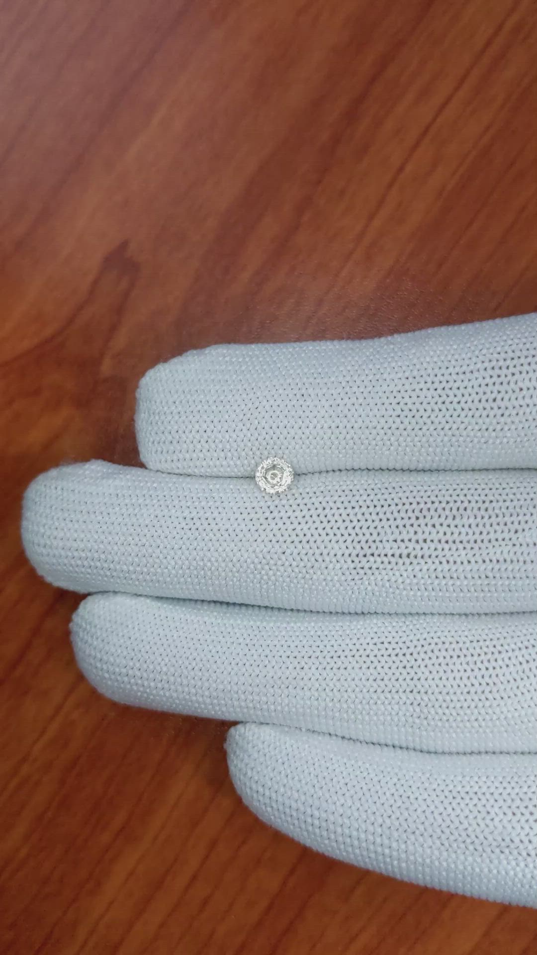 0.55 Ct. Peach Sapphire from Ceylon (Sri Lanka) Size Video