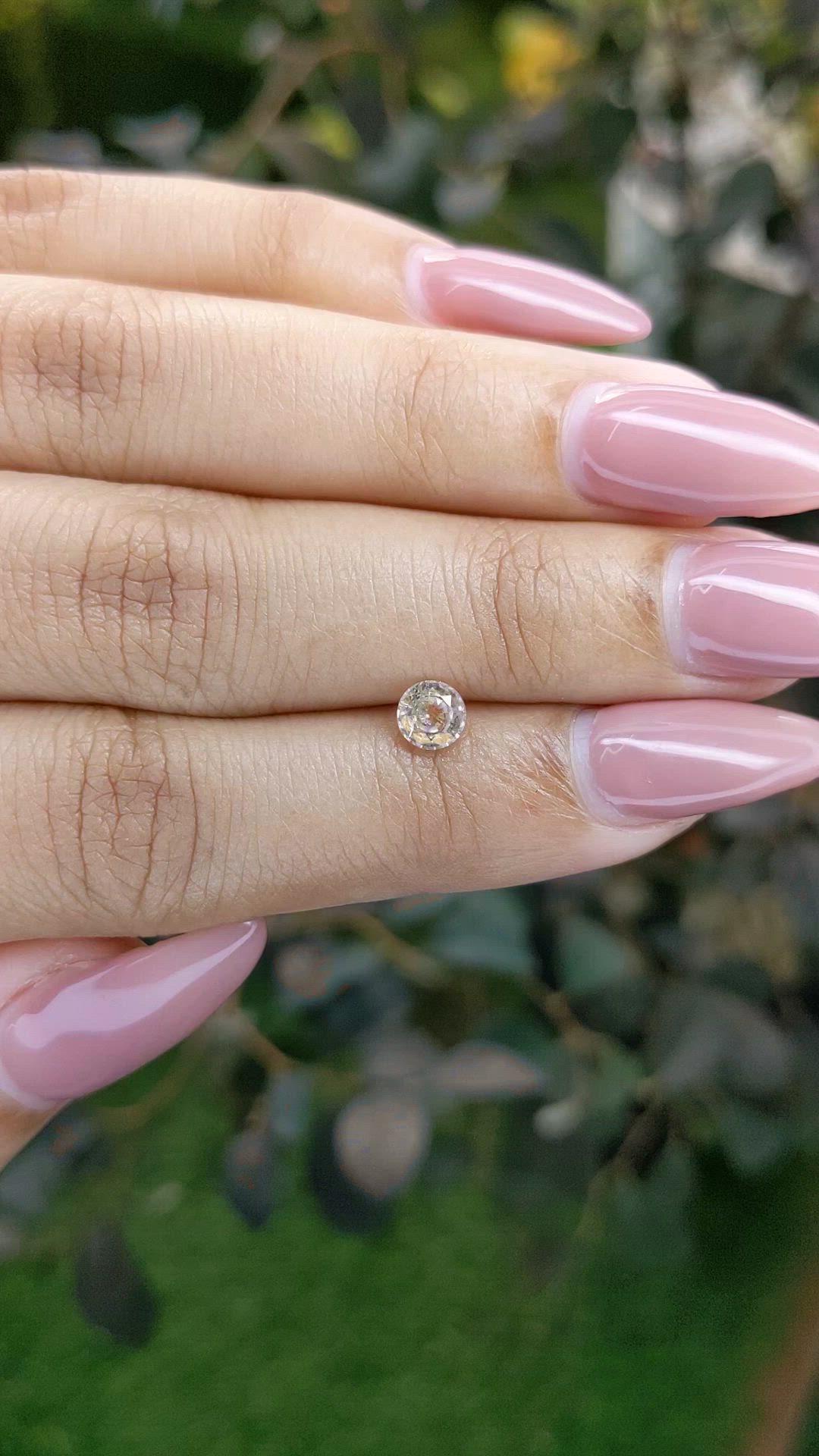 0.55 Ct. Peach Sapphire from Ceylon (Sri Lanka) Size Video
