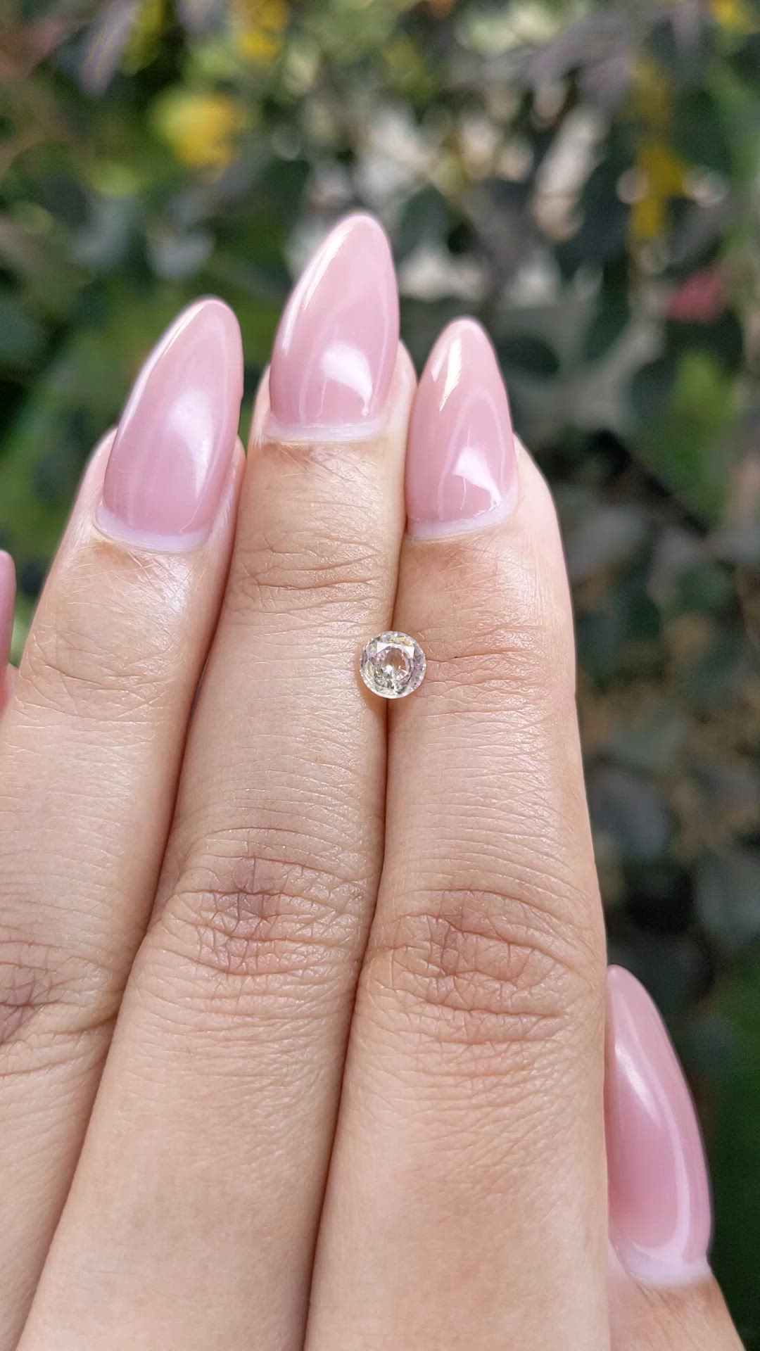 0.55 Ct. Peach Sapphire from Ceylon (Sri Lanka) Size Video