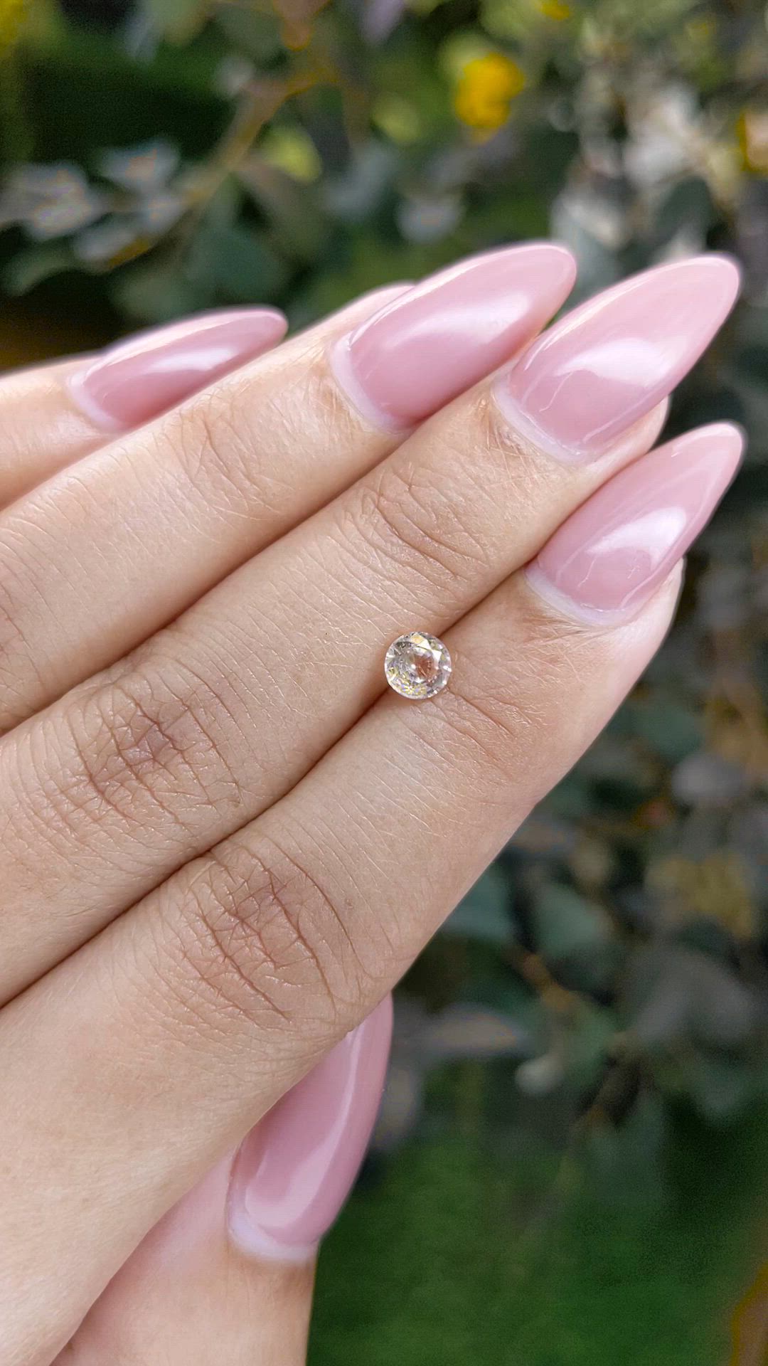 0.55 Ct. Peach Sapphire from Ceylon (Sri Lanka) Size Video
