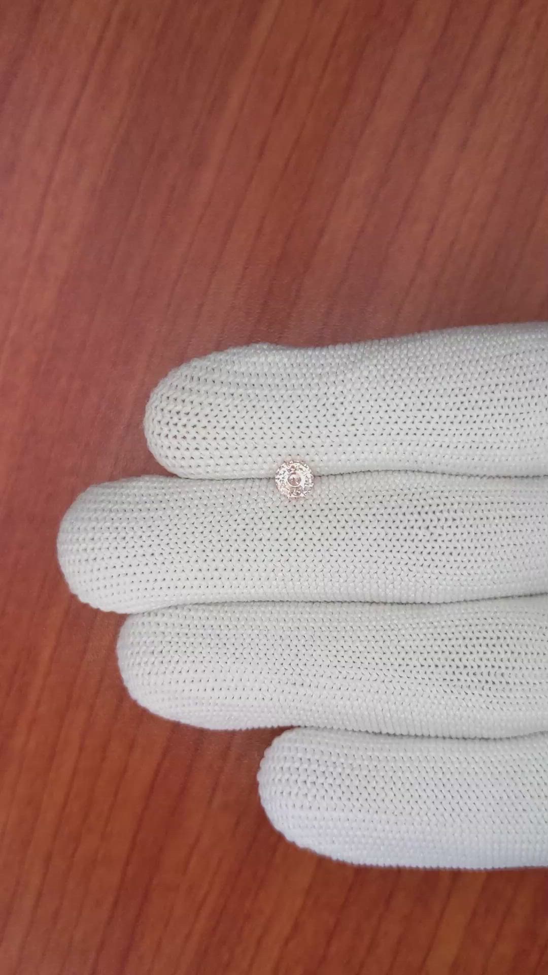 0.50 Ct. Peach Sapphire from Ceylon (Sri Lanka) Size Video