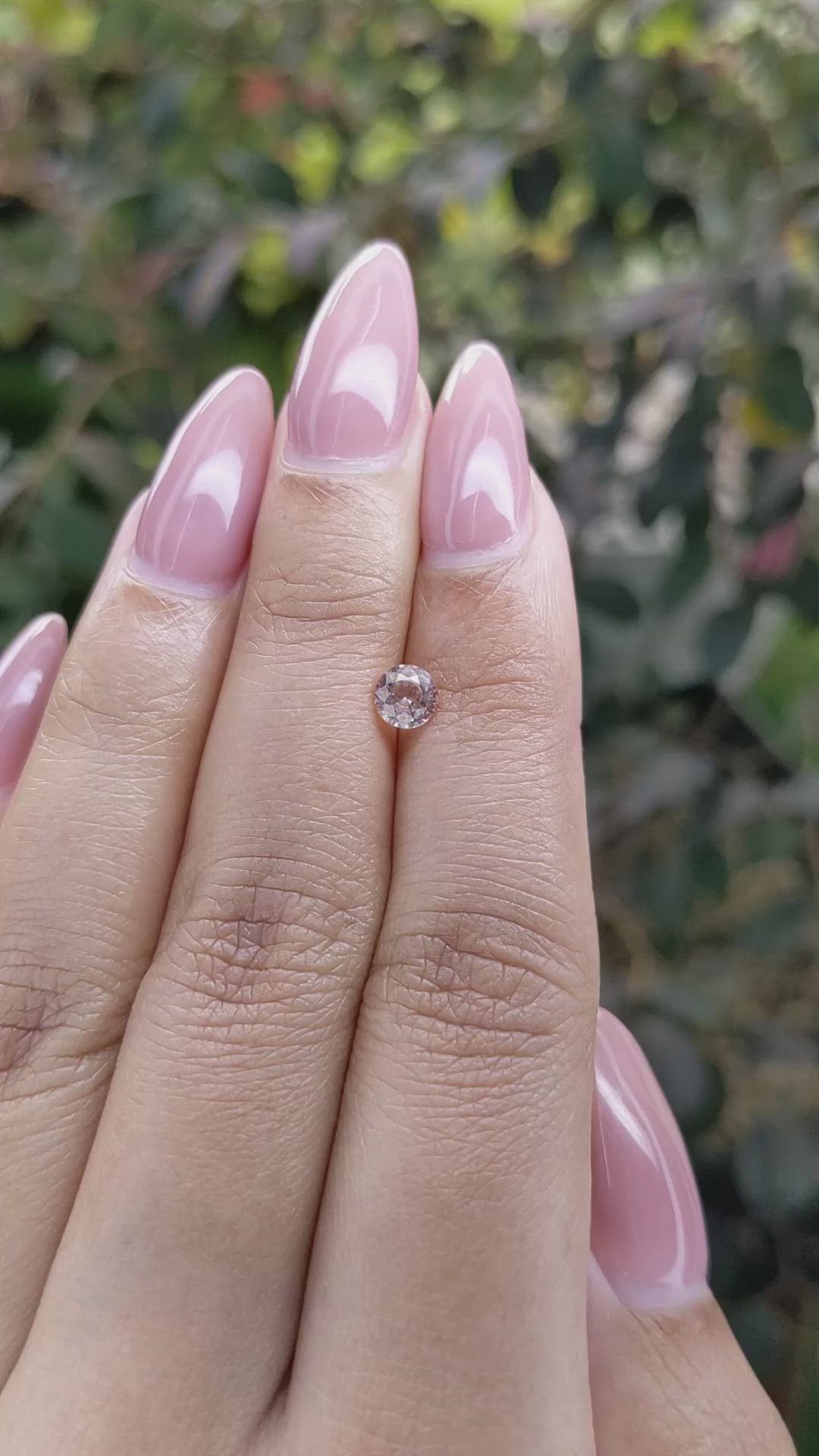 0.50 Ct. Peach Sapphire from Ceylon (Sri Lanka) Size Video