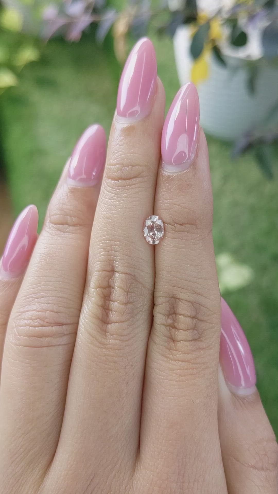 0.70 Ct. Peach Sapphire from Ceylon (Sri Lanka) Size Video