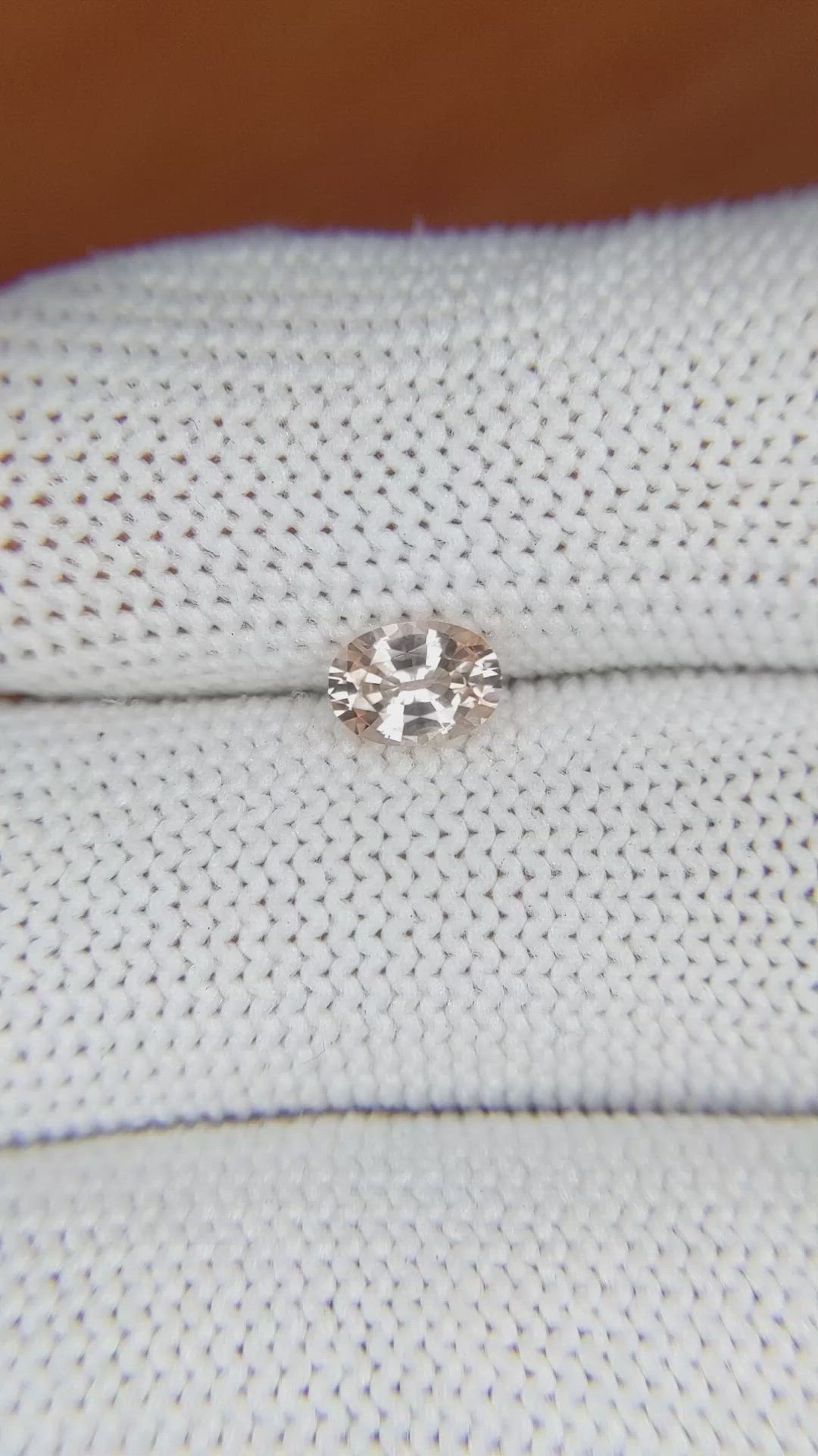 0.70 Ct. Peach Sapphire from Ceylon (Sri Lanka) Size Video