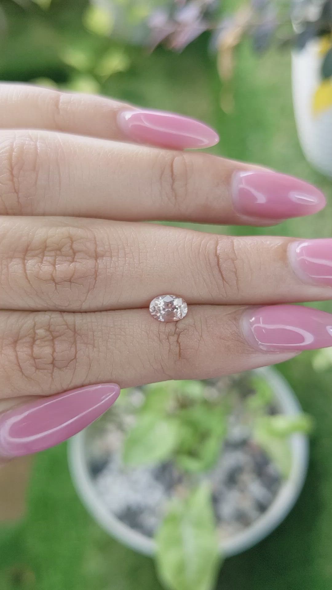 0.70 Ct. Peach Sapphire from Ceylon (Sri Lanka) Size Video