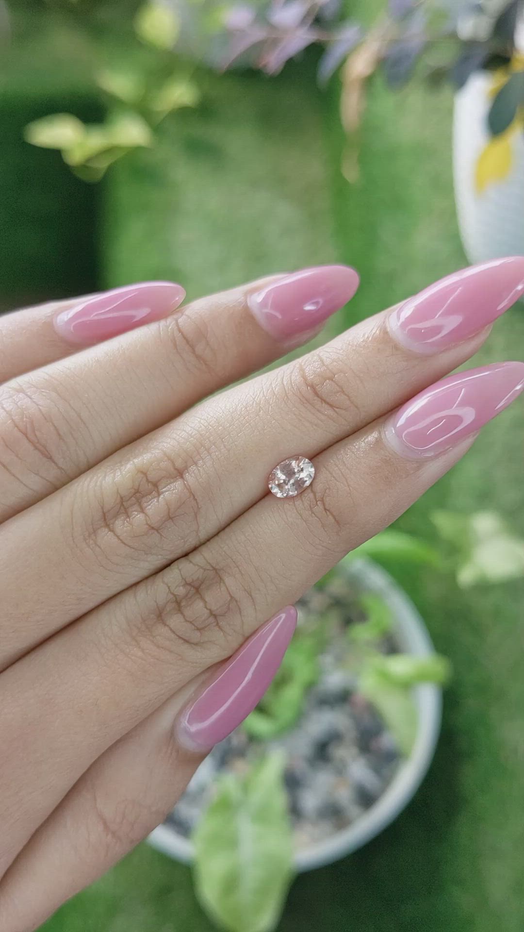 0.70 Ct. Peach Sapphire from Ceylon (Sri Lanka) Size Video