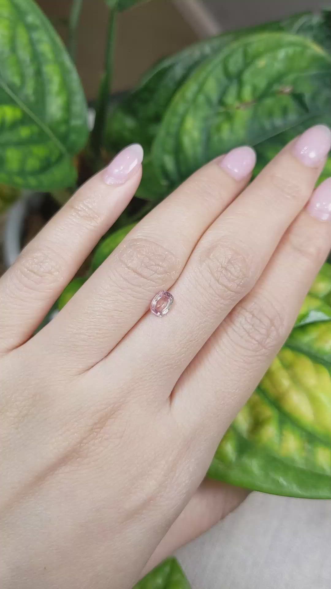 0.64 Ct. Peach Sapphire from Ceylon (Sri Lanka) Size Video