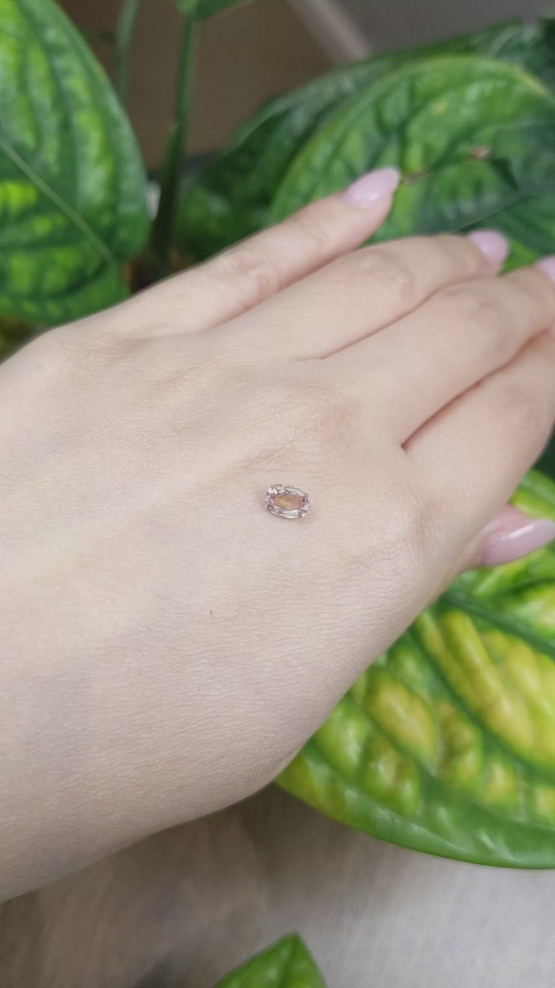 0.64 Ct. Peach Sapphire from Ceylon (Sri Lanka) Size Video