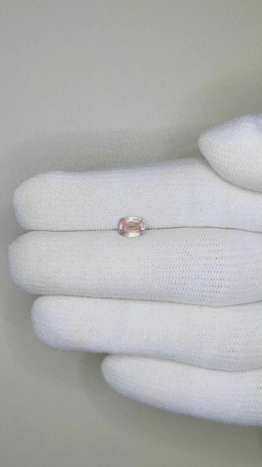 0.64 Ct. Peach Sapphire from Ceylon (Sri Lanka) Size Video