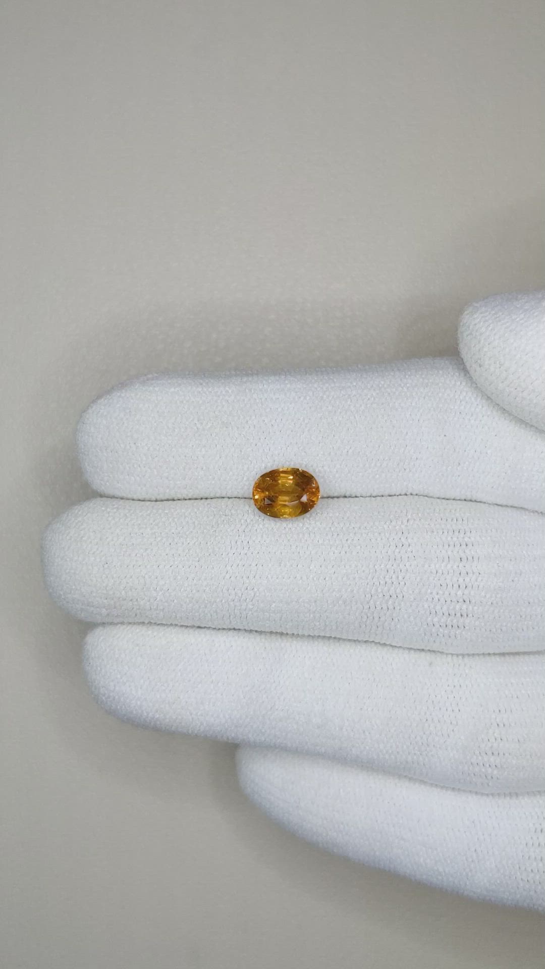 1.61 Ct. Orangish Brown Sapphire from Madagascar Size Video